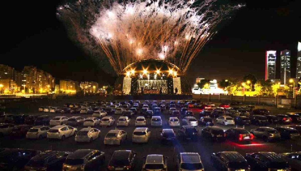 Image of cars park outside a concert in the UK