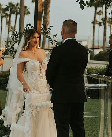 Bride standing with groom