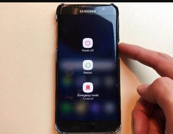 Samsung phone displaying power options - How to clear cache on android