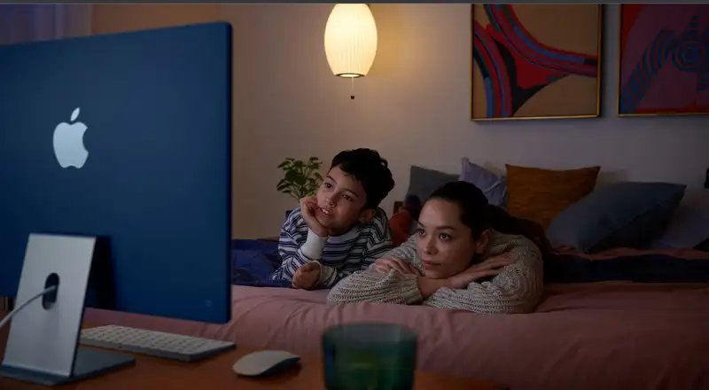 Mother and son watching movie using Apple Mac Pc - how to record mac screen