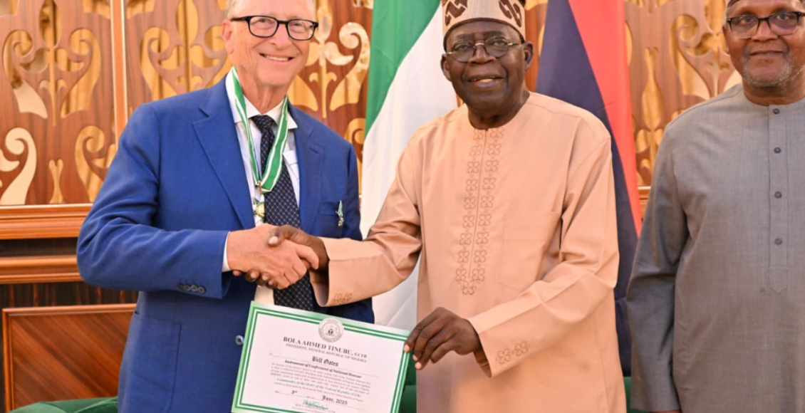 Bill Gates standing left and President of Nigeria Tinubu